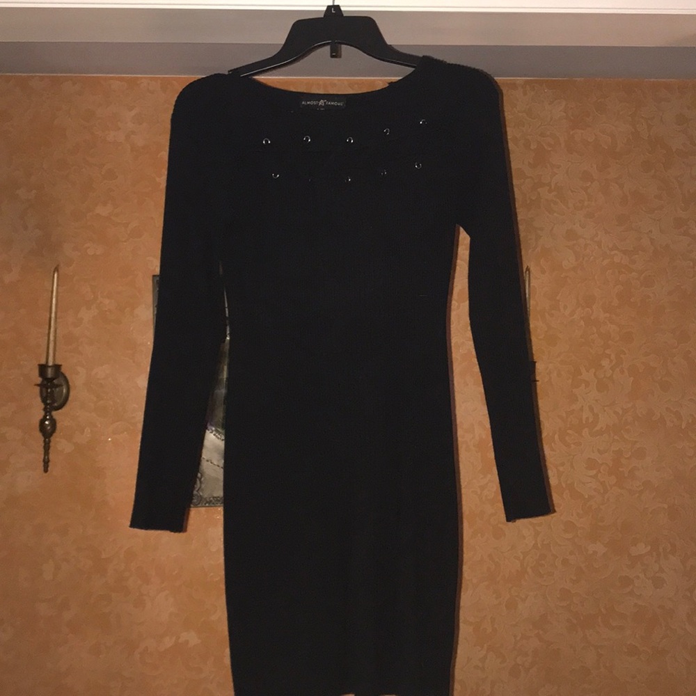 Black long sleeved body-con dress